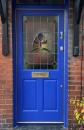 The new door with repaired stained glass - after window