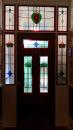 Front door and surrounding windows